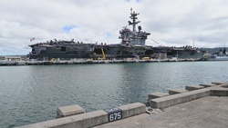 USS Carl Vinson Logistics Specialists drive forklifts following NAVSUP Fleet Logistics Center pier side offload