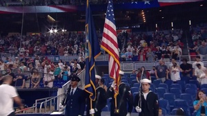 United States Southern Command Joint Color Guard presents the American flag at a Miami Marlins game on July 4th, 2025