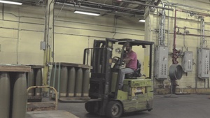 Forklift Moving M795 Cartridge Cases