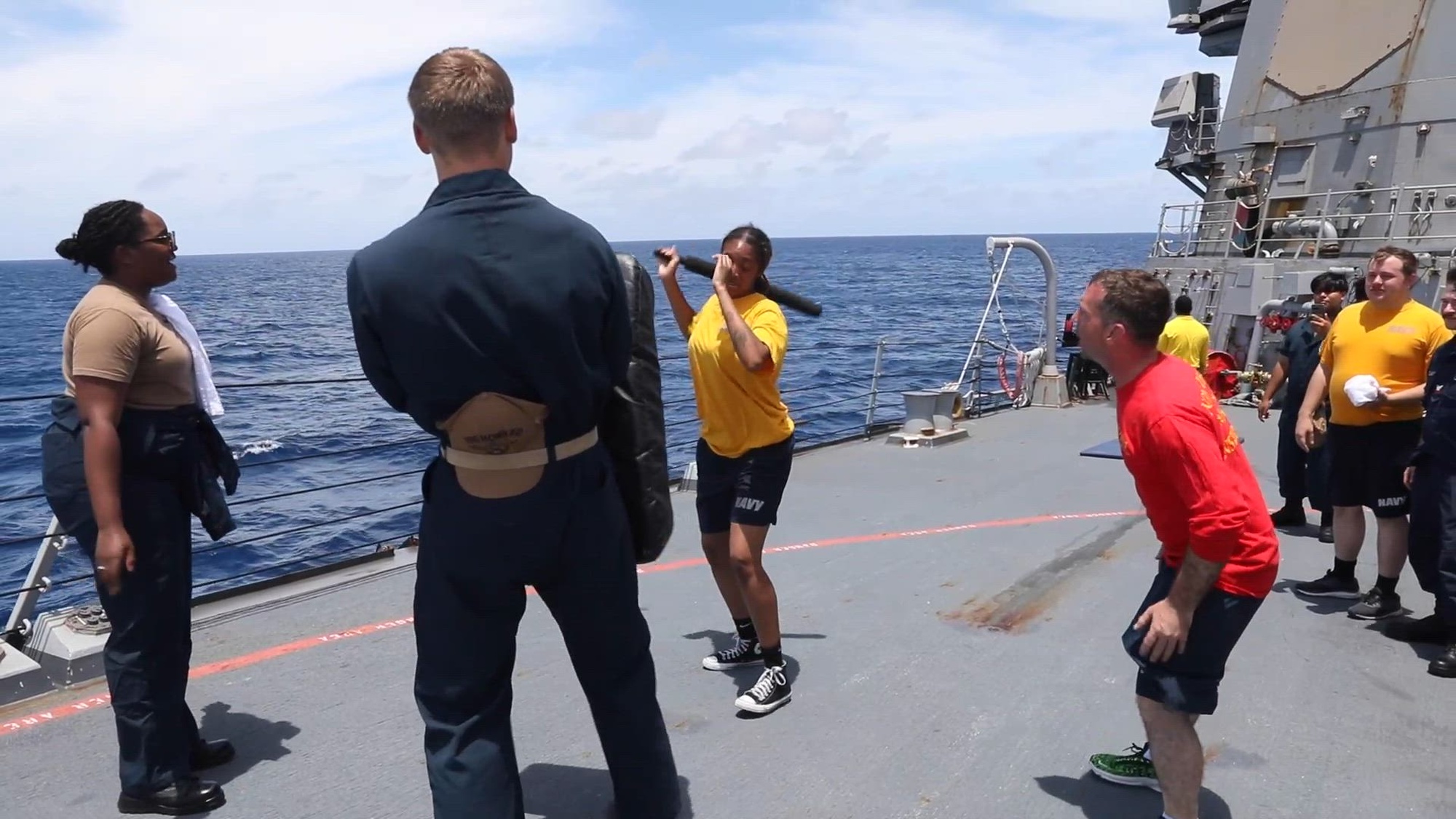 240627-N-CV021-1001 EAST CHINA SEA (June 27, 2024) Sailors aboard the Arleigh Burke-class guided-missile destroyer USS Howard (DDG 83) participate in a sea contamination exercise on the fo’c’sle in the East China Sea, June 27. Howard is forward-deployed and assigned to Destroyer Squadron (DESRON) 15, the Navy’s largest DESRON and the U.S. 7th Fleet’s principal surface force. (U.S. Navy photo by Mass Communication Specialist 3rd Class Alexandria Esteban)