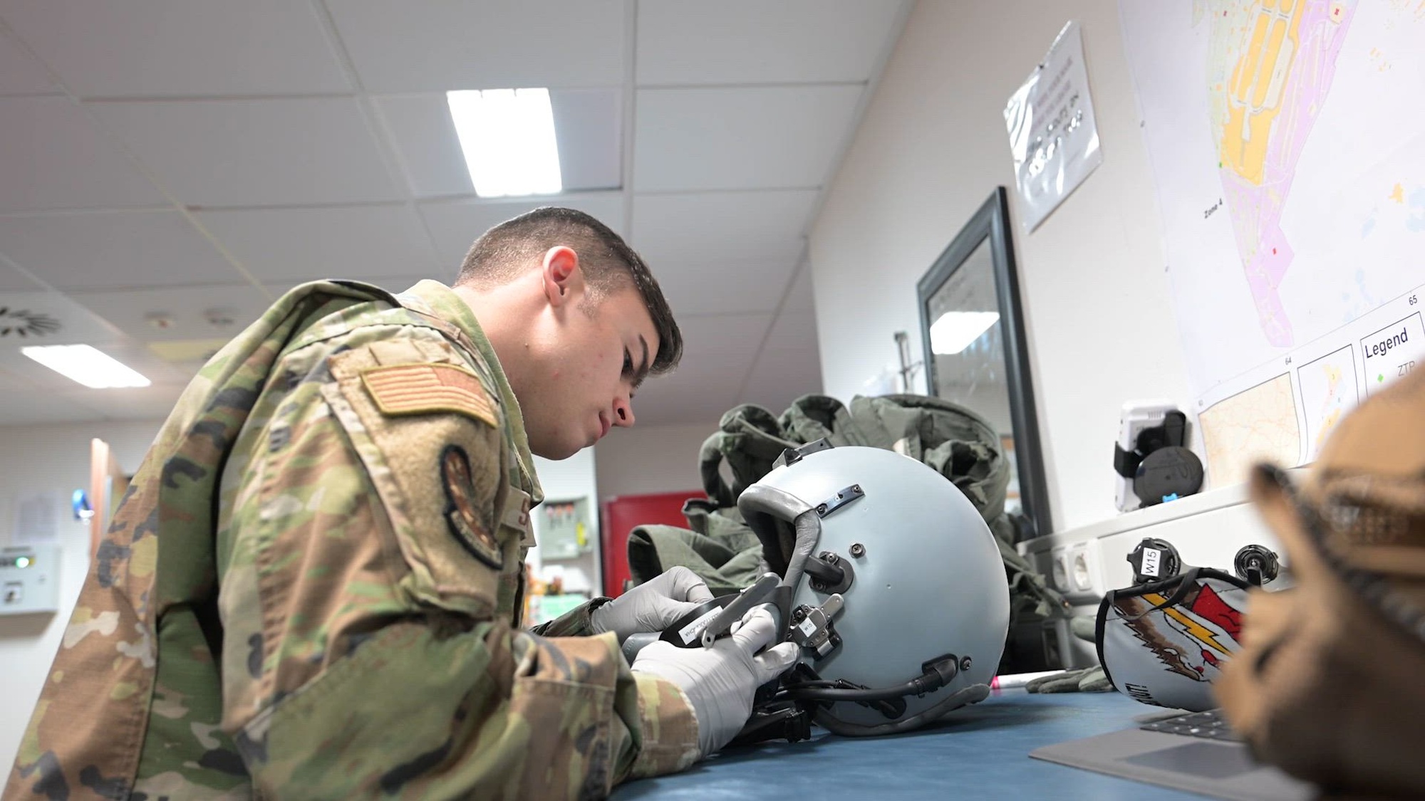 The 52nd Operations Support Squadron Aircrew Flight Equipment shop provides necessary flight equipment to 480th Fighter Squadron pilots before take-off, at Spangdahlem Air Base, Germany. The AFE shop supports the 52nd Fighter Wing mission to deliver airpower options to deter and combat aggression by inspecting and providing life-saving equipment to the 480th FS pilots. (U.S. Air Force video by Senior Airman Jessica Sanchez-Chen)