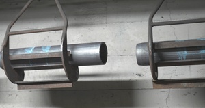 Close up of Cartridge Case Moving Through the Underground Subway for Cooling and Inspection Prior to the Next Phase of the Production Process at Scranton Army Ammunition Plant