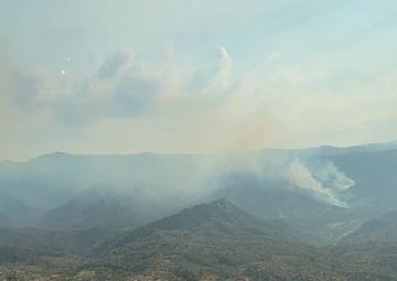 California Air National Guard Aerial Fire Fighting C-130J Drops Retardant on Trout Fire