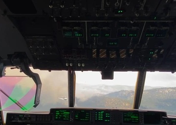 California Air National Guard Aerial Fire Fighting C-130J Drops Retardant on 'Packsaddle' and 'Laura Fire'