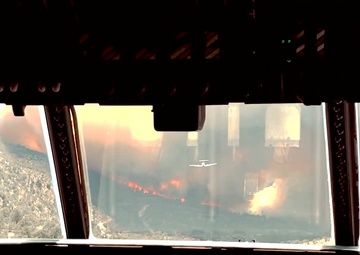 California Air National Guard Aerial Fire Fighting C-130J Drops Retardant on Long Fire