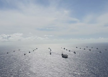 Multinational Ships sail in formation during RIMPAC 2024