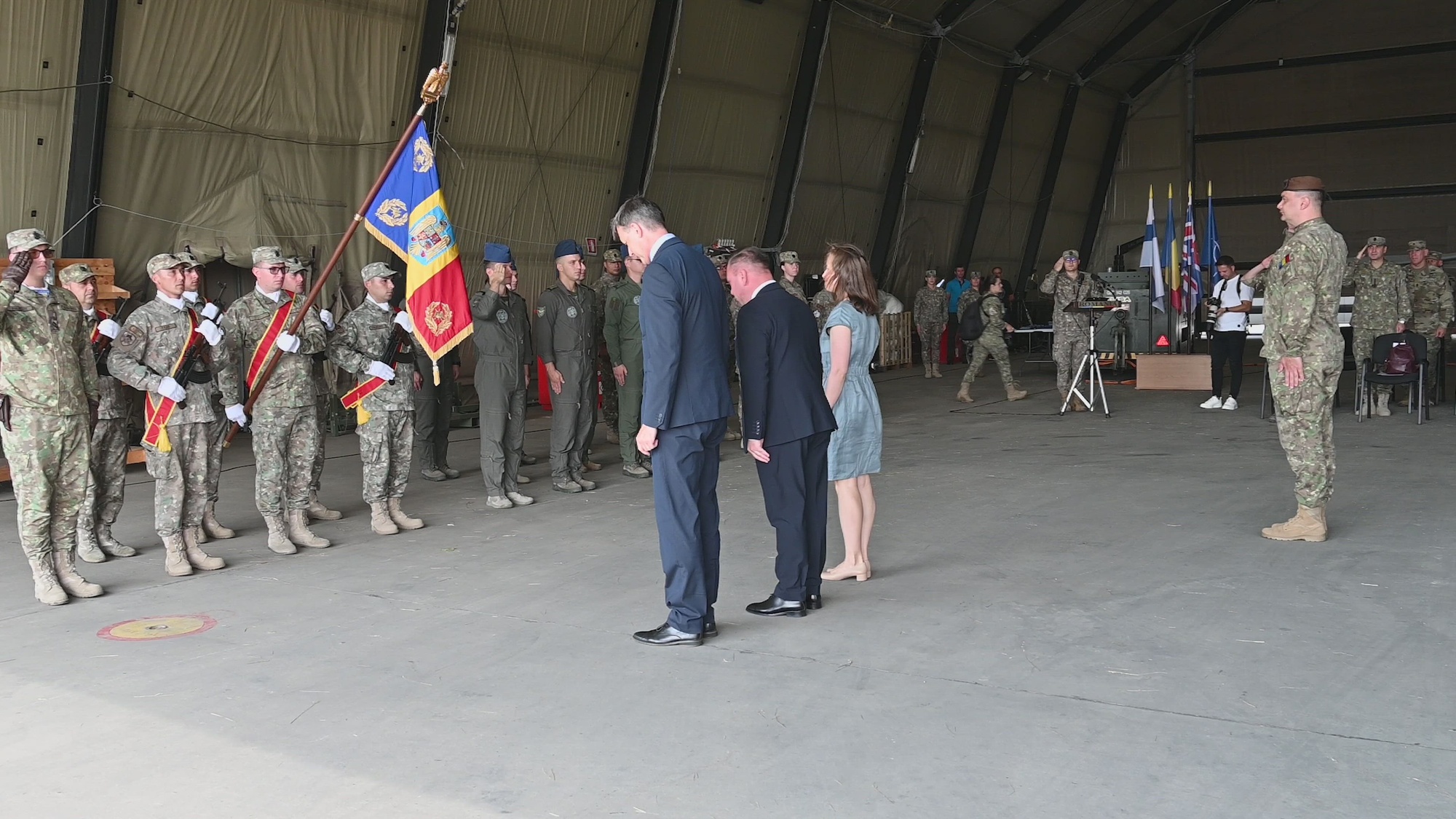 Military personnel and dignitaries attending Finland's and England's Air Force closing ceremony at Mihail Kogalniceanu Air Base, Romania, July 23, 2024. This event marks Finland's and England’s end of a successful mission of NATO operations, signifying a strengthened alliance and enhanced collective security in the region. 