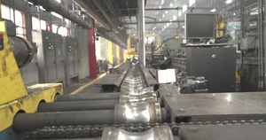 Projectile Case on Conveyor Headed to the Next Step in Production Process