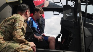 Soldiers from 12th Combat Aviation Brigade provide aircraft tours to children from the Box4Kids Initiative
