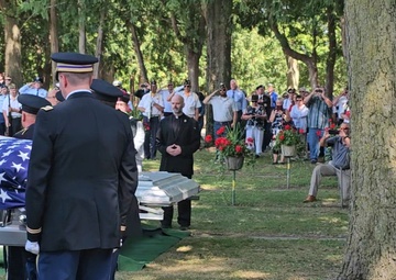 Coverage of Mass of Christian Burial Graveside Service for Sgt. Jack Hohlfeld in La Crosse, Wis. — home after 82 years