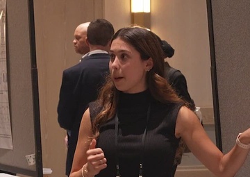 NHRC's Carlie Daquino Presents Her First Poster at the 2024 Military Health System Research Symposium