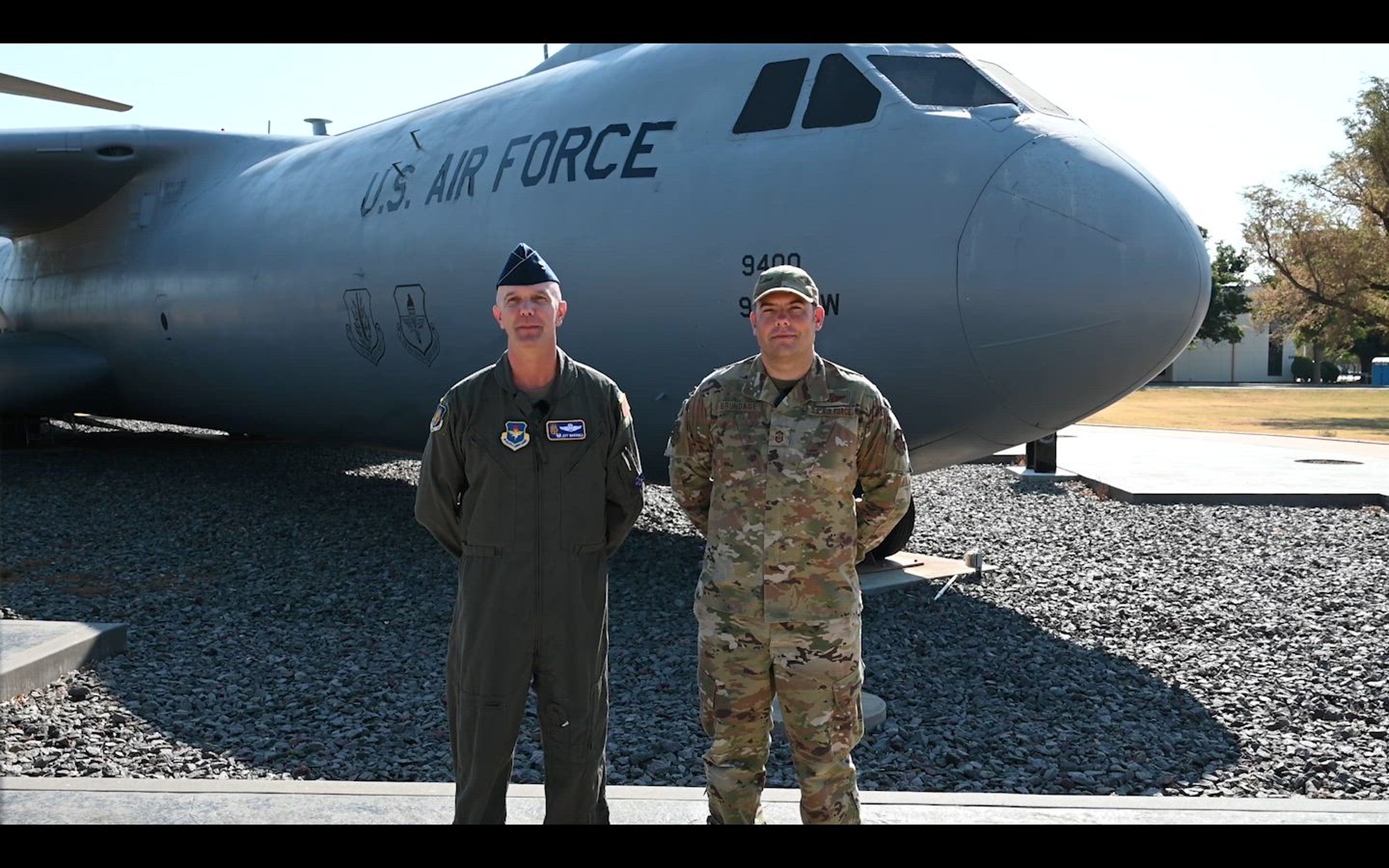 U.S. Air Force Col. Jeff Marshall, 97th Air Mobility Wing (AMW) commander, and Chief Master Sgt. Justin Brundage, 97th AMW command chief, discuss the Combat Dining Out at Altus Air Force Base, Oklahoma, Sept. 14, 2024. The Combat Dining out  is a tradition that originated from the British military’s formal mess nights to boost morale and foster camaraderie. (U.S. Air Force video by Senior Airman Miyah Gray)