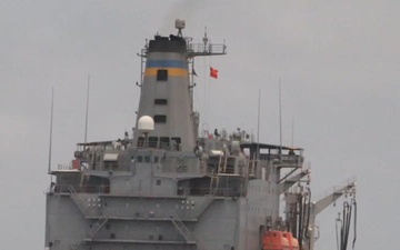 USS Daniel Inouye conducts a replenishment-at-sea