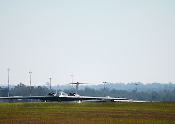 B-roll of B-2 Spirit stealth bomber taking off and night landing