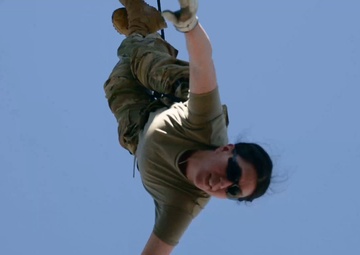 Field Artillery Soldiers Take Part in a Rappel Tower Morale Activity
