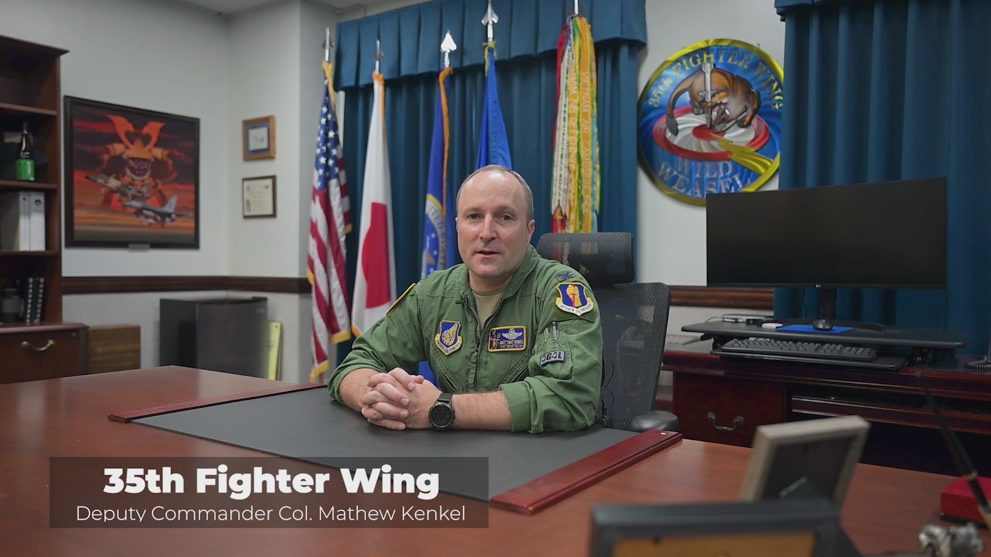 U.S. Air Force Col. Matthew Kenkel, 35th Fighter Wing deputy commander, calls agencies across Misawa Air Base to show how they cut the Air Force birthday cake at Misawa Air Base, Japan, Sept. 18, 2024. Sept. 18, 2024, is the 77th anniversary of the Air Force. 