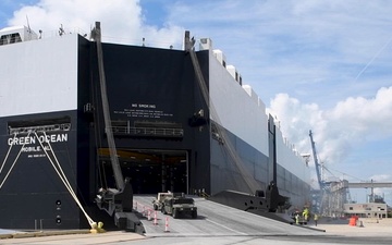 841st Transportation Battalion unload equipment during a critical force rotation