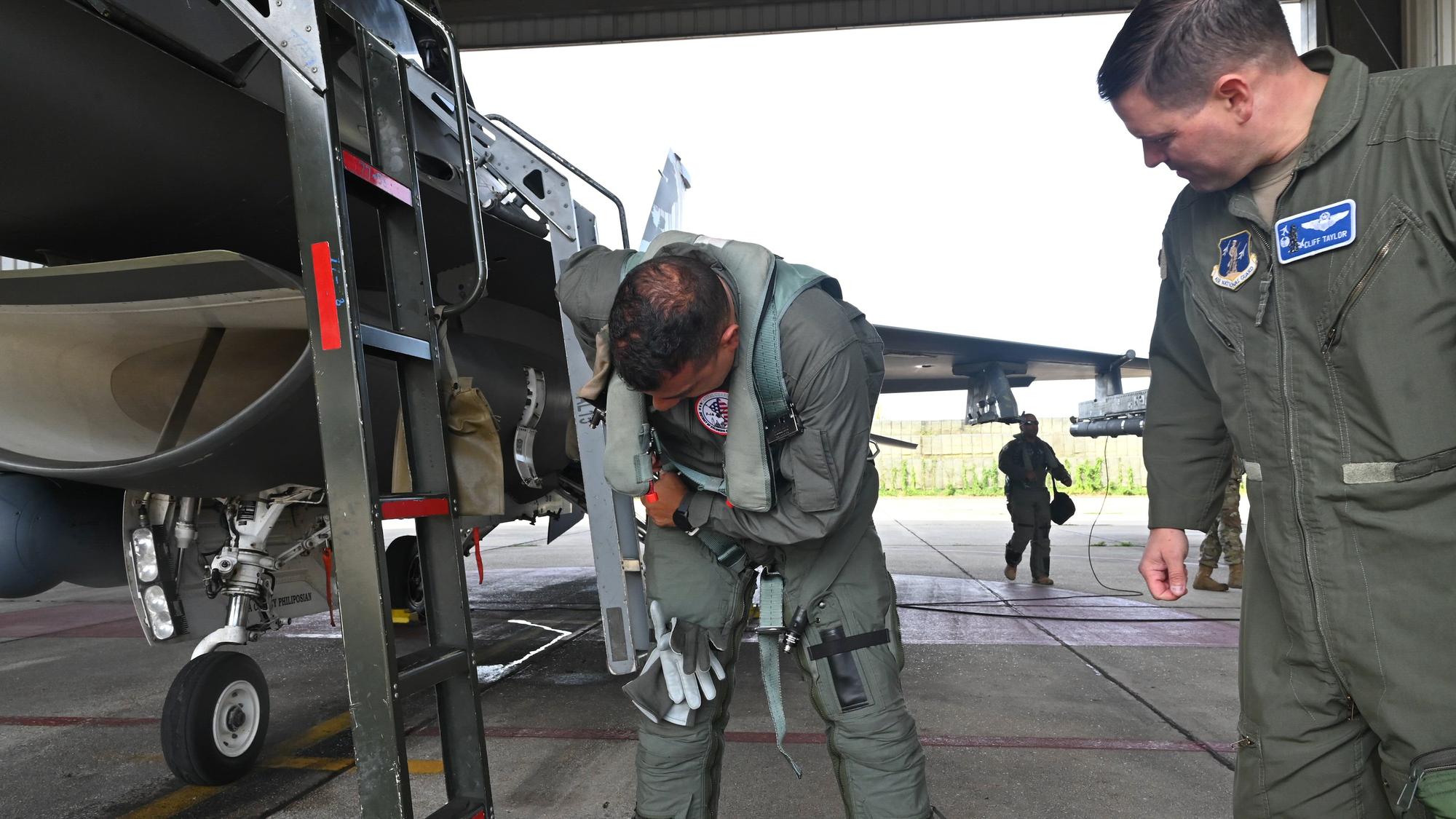 U.S. Army Maj. Gen. John C. Andonie, Commanding General (Interim), District of Columbia National Guard, receives a familiarization flight on a F-16D Fighting Falcon at Joint Base Andrews, Md., Sept. 4, 2024. The aircraft was flown by U.S. Air Force Col. Jerome Wonnum, deputy commander, 113th Wing Operations Group. Since Sept. 11, 2001, the 113th Wing's Aerospace Control Alert (ACA) mission has protected the skies 24/7 above the National Capital Region. (U.S. Air National Guard video by Master Sgt. Arthur M. Wright)