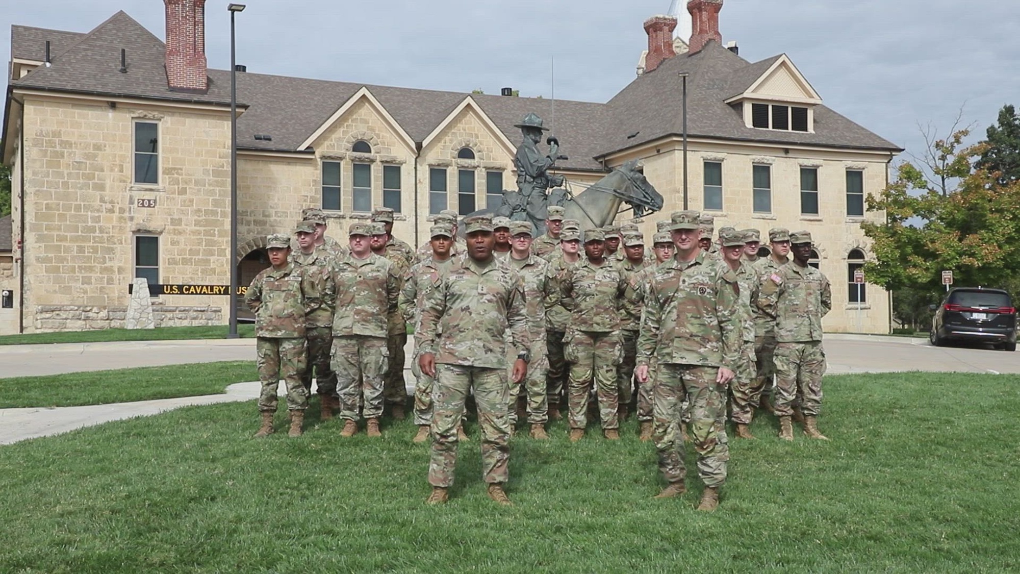 Maj. Gen. Monte Rone, commanding general 1st Infantry Division and Fort Riley, and Command Sgt. Maj. Derek Noyes, command sergeant major 1st Infantry Division, give a &quot;Go Army, beat Tulsa&quot; shout out message.