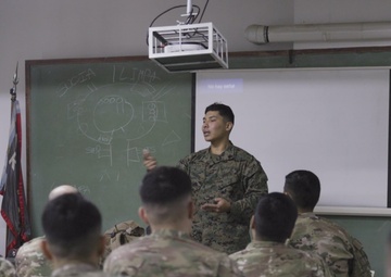 U.S. Marine Corps Mountain Warfare Instructors exchange knowledge with Argentine marines during pre-environmental training