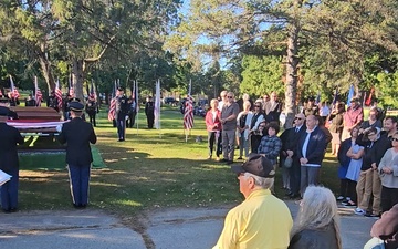 Rendering honors to former World War II Army Private Robert Skaar during military burial in La Crosse