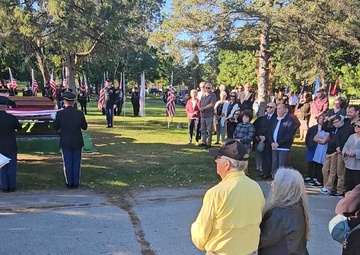 Rendering honors to former World War II Army Private Robert Skaar during military burial in La Crosse