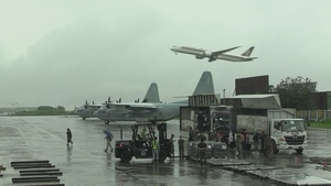 III Marine Expeditionary Force, Philippine Air Force stage USAID food supplies for humanitarian relief efforts