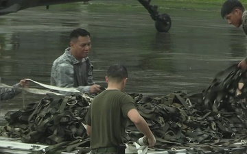 III Marine Expeditionary Force, Philippine Air Force stage equipment for transport to support humanitarian relief efforts