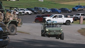 Bravo Company, 1st Battalion, 325th Airborne Infantry Regiment, 82nd Airborne Division, serve hot meals to local communities