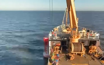 Coast Guard Cutter Barbara Mabrity work buoys in Charlotte Harbor