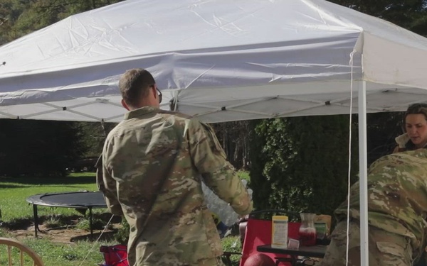 Soldiers assigned to Joint Task Force - Civil Support, serve food in local communities.
