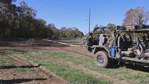 1-502nd Infantry Battalion assist Charles D. Owen Middle School