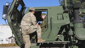 U.S. Army soldiers display combat vehicles in Johvi, Estonia