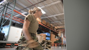 188th Wing LRS IPE Manager Tech Sgt. Ashley Green stores deployment gear