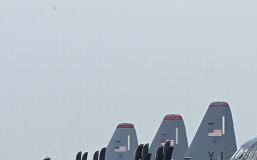 374 LRS Airmen load cargo onto C-130J