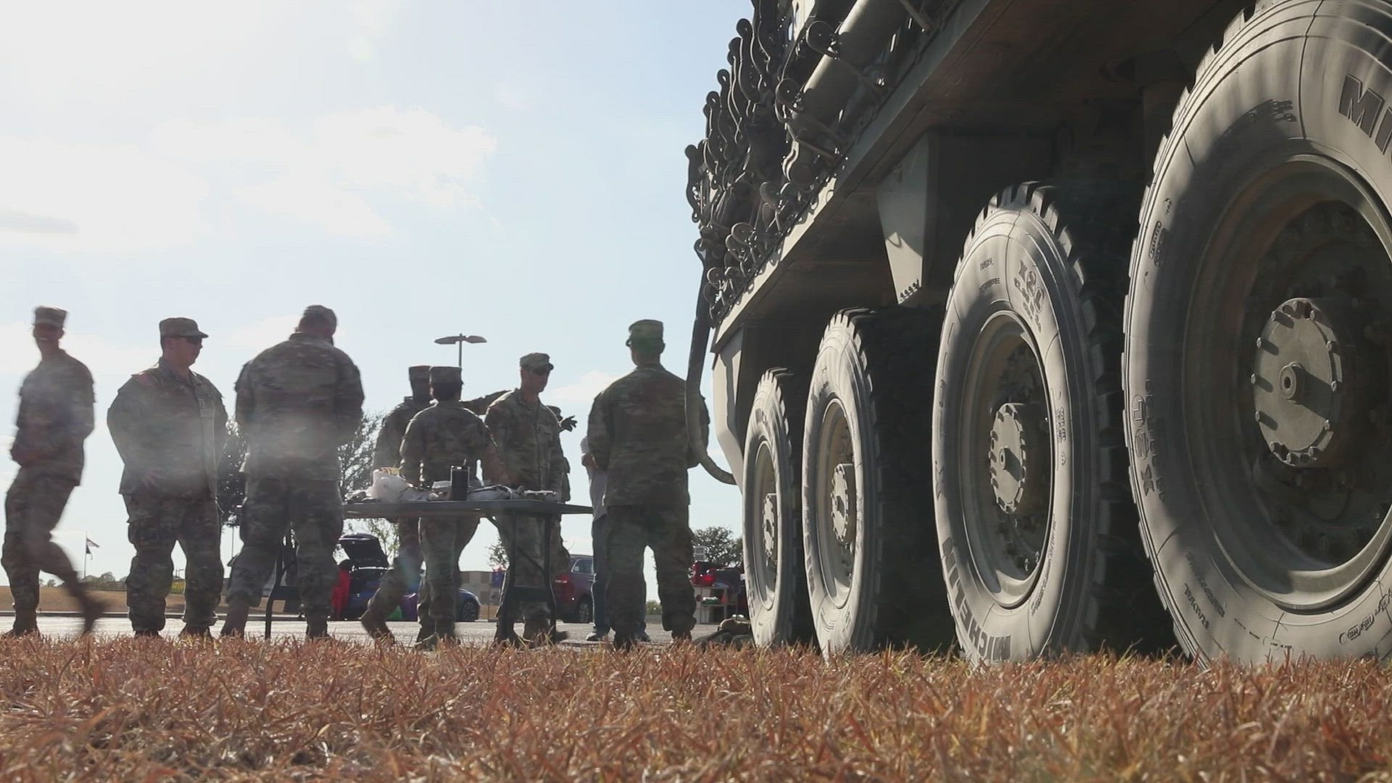 Soldiers assigned to Mobile Command Group, Headquarters and Headquarters Battalion, III Armored Corps, at Fort Cavazos, participate in a Halloween themed trunk or treat with Eastern Hills Middle School, in Harker Heights, TX, Oct. 25, 2024. This event was aimed at building relationships between the Soldiers and members of the Harker Heights community. (U.S. Army video by Spc. Nathan Morse)
