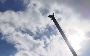 Crews construct floating platform for Lake Lure debris removal