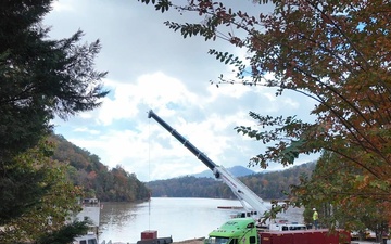 Crews construct floating platform for Lake Lure debris removal