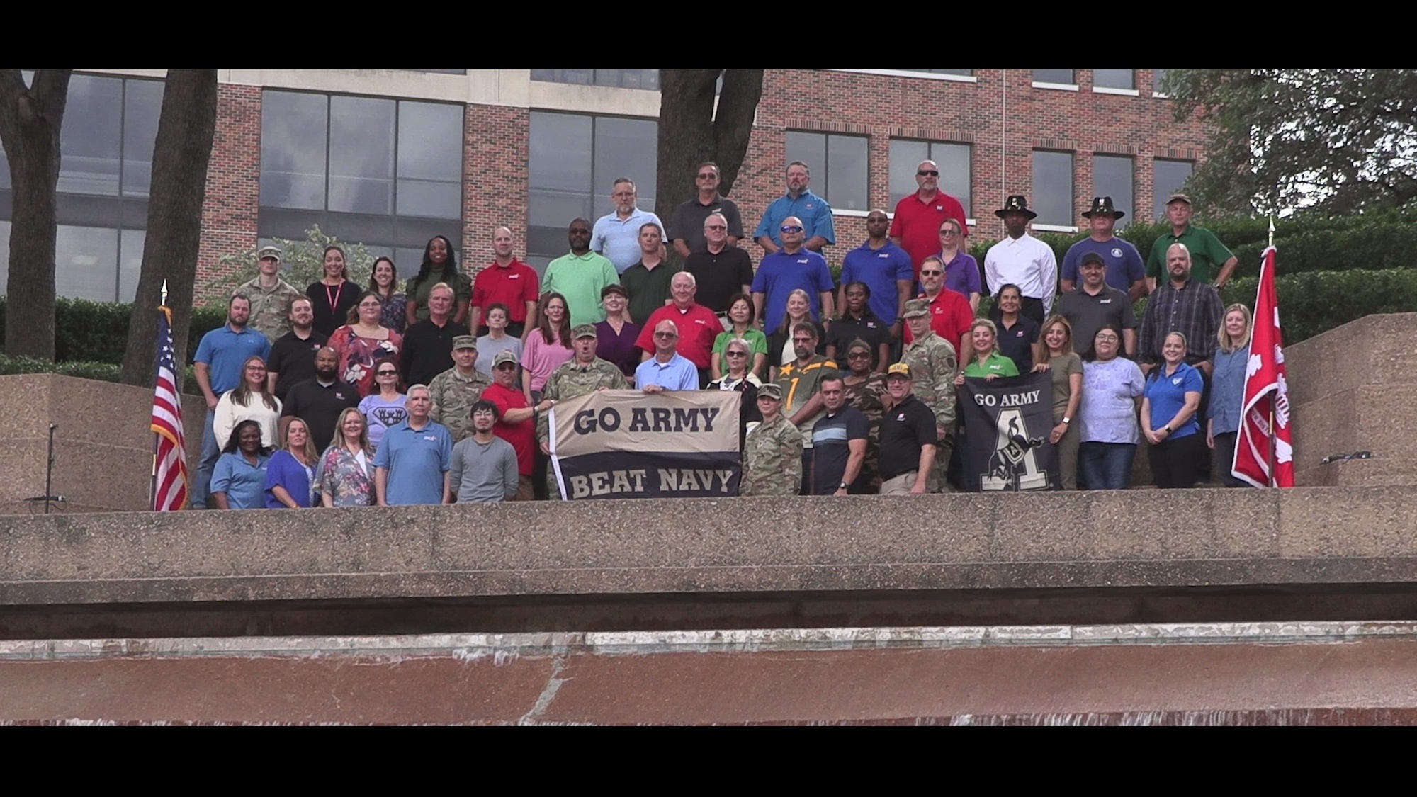 We are the men and women of the U.S. Army Corps of Engineers, Fort Worth District, cheering on the Army Black Knights. Go Army, Beat Navy!