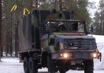 French Soldiers prepare vehicles during multi-national exercise