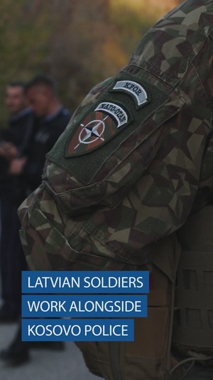NATO-led Kosovo Forces work alongside Kosovo Police on security patrol