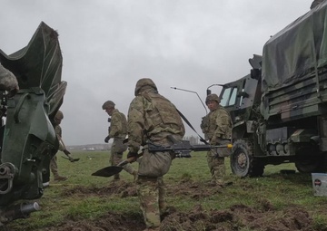 U.S. Soldiers emplace an M777 A2 howitzer during Dynamic Front 25 exercise
