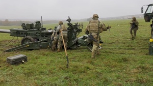U.S. Soldiers emplace artillery and prepare for Dynamic Front 25 live fire exercise