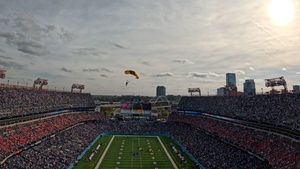 Members of the U.S. Army Parachute Team perform a demonstration jump into Nissan Stadium Sunday, November 17th, 2024.