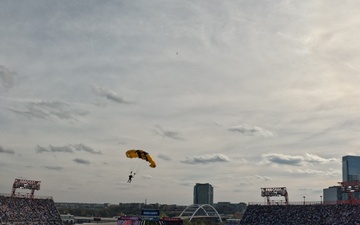 Members of the U.S. Army Parachute Team perform a demonstration jump into Nissan Stadium Sunday, November 17th, 2024.