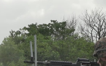 MACS-4 Marines fire M240 machine guns during live fire range.