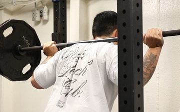 Squat competition aboard USS George H.W. Bush