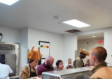 37th Training Wing Leadership serve at BMT Dining Facility