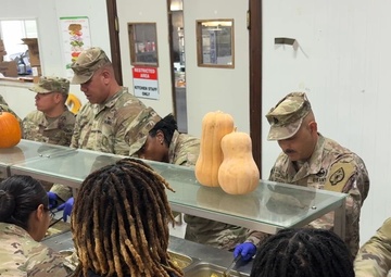 17th Sustainment Brigade command team serve Thanksgiving dinner to Soldiers