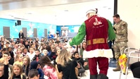 New York Yankees pitcher and Santa Claus visit Tinker K-8